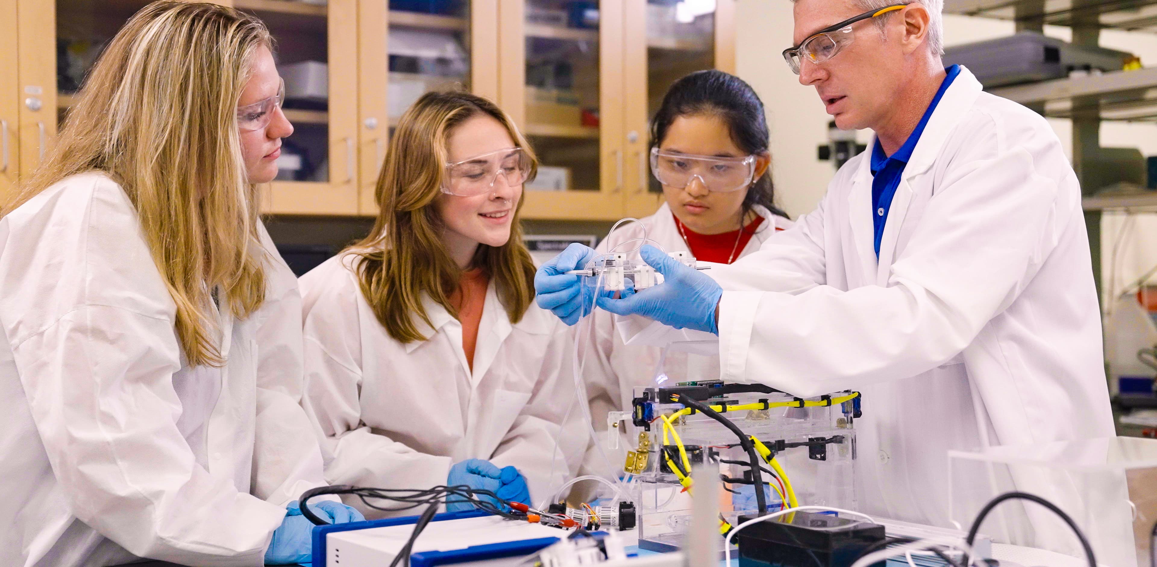 Dr. Gettens in the BME lab with students